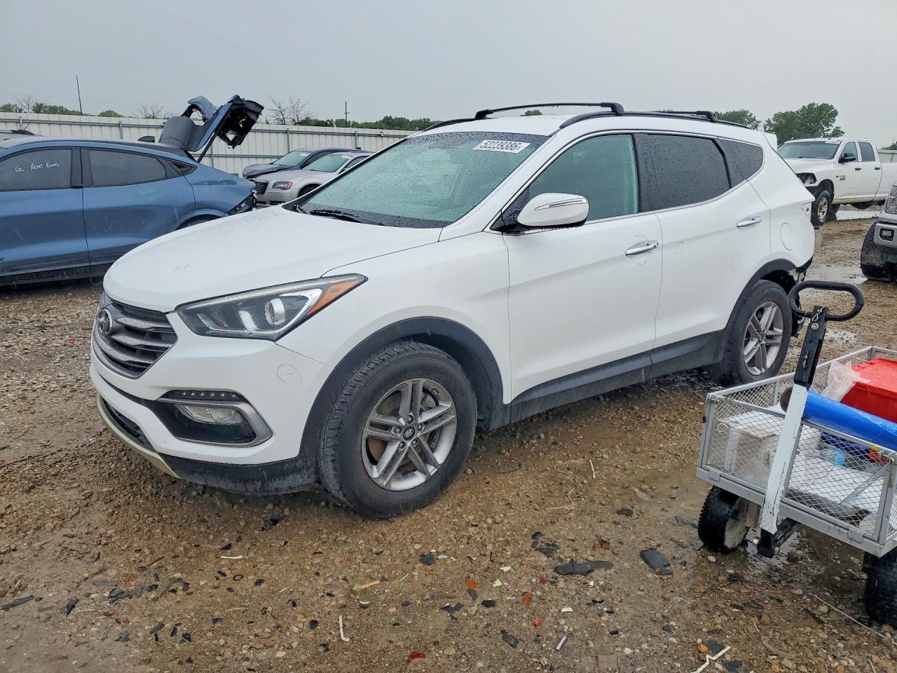5NMZU3LB2JH057778 · 2018 HYUNDAI SANTA FE SPORT