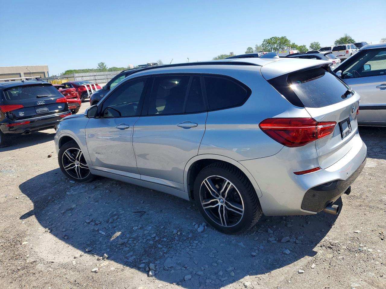 WBXHT3C30H5F82302 · 2017 BMW X1 · 2/13