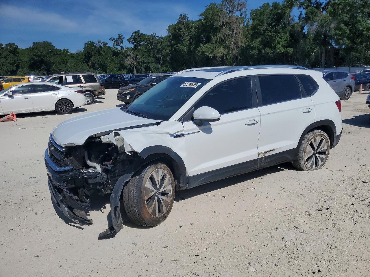 3VVEX7B27PM305609 · 2023 VOLKSWAGEN TAOS