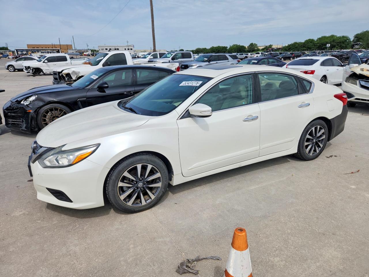 1N4AL3APXGC153332 · 2016 NISSAN ALTIMA