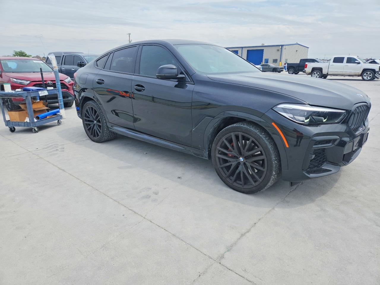 5UXCY6C08P9S07034 · 2023 BMW X6 · 4/13