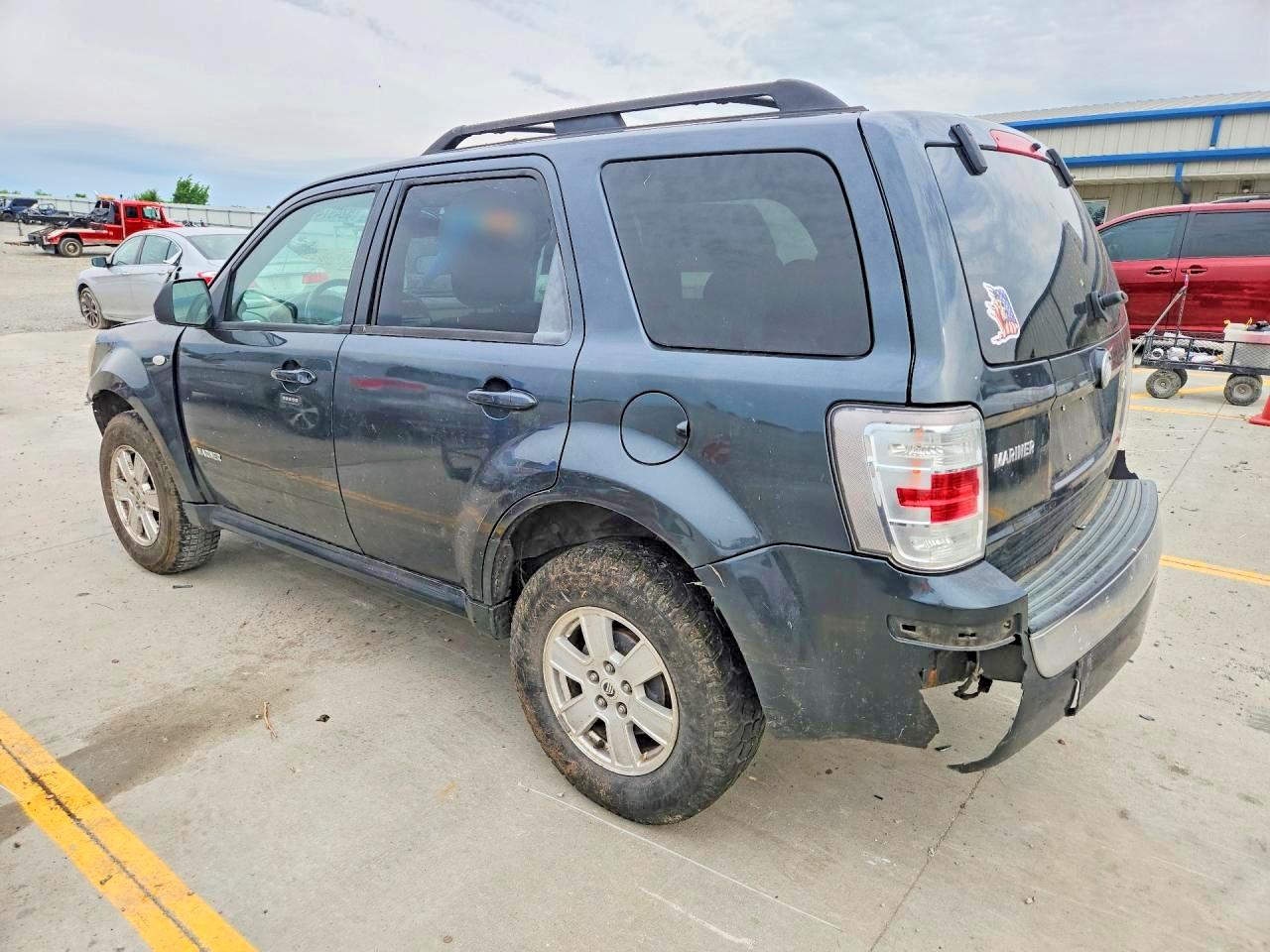 4M2CU91138KJ08698 · 2008 MERCURY MARINER · 2/13