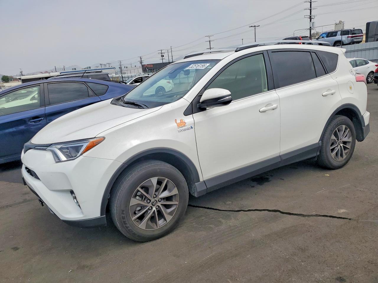 JTMRJREV7JD203054 · 2018 TOYOTA RAV4 HYBRID