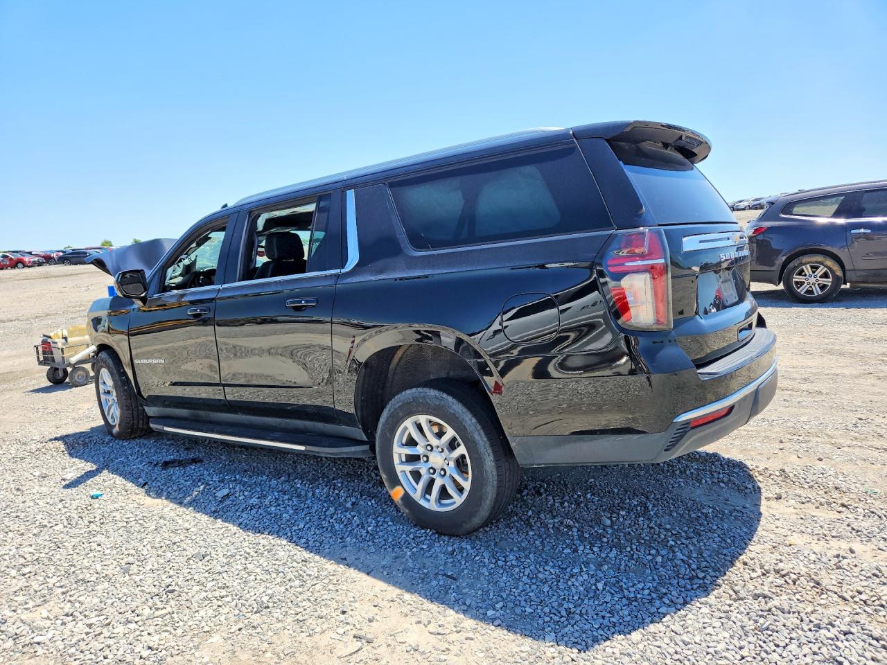 1GNSCBKDXPR271303 · 2023 CHEVROLET SUBURBAN · 2/13