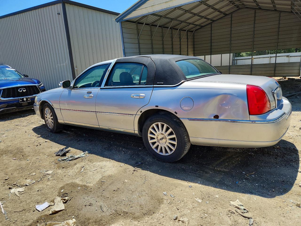 1LNHM83W94Y618913 · 2004 LINCOLN TOWN CAR · 2/12