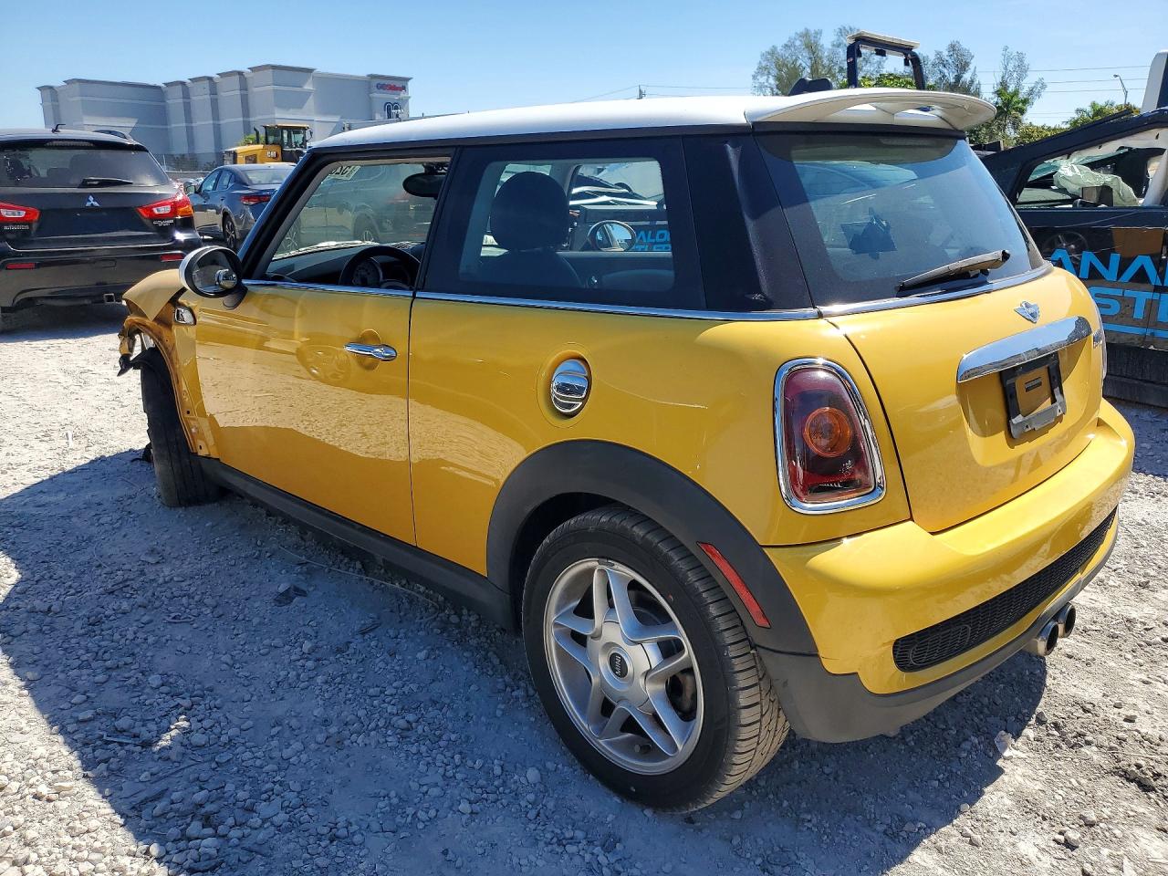 WMWMF73599TW82904 · 2009 MINI COOPER · 2/13