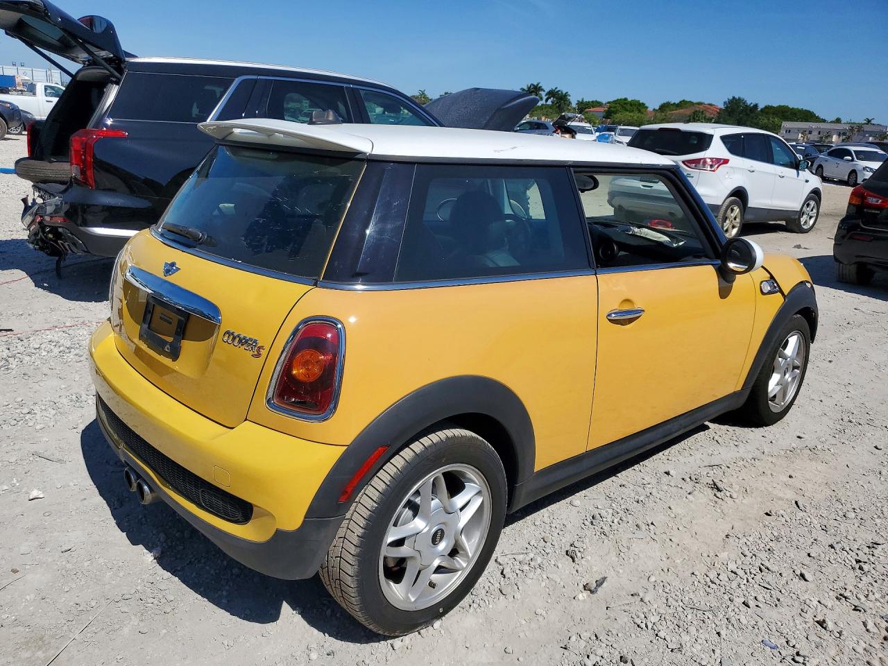 WMWMF73599TW82904 · 2009 MINI COOPER · 3/13
