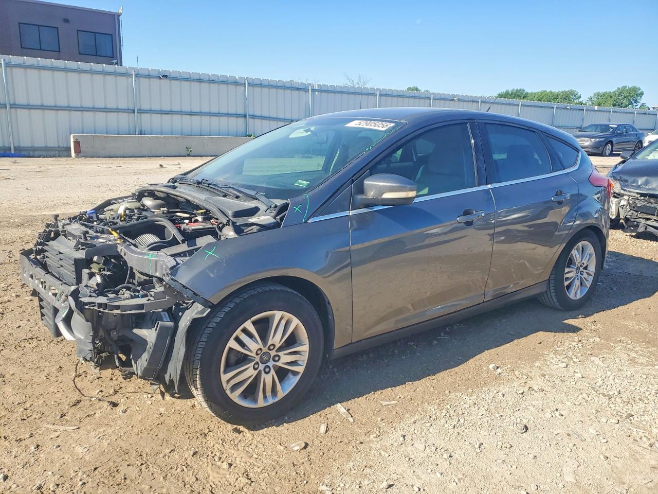 1FAHP3M21CL429975 · 2012 FORD FOCUS