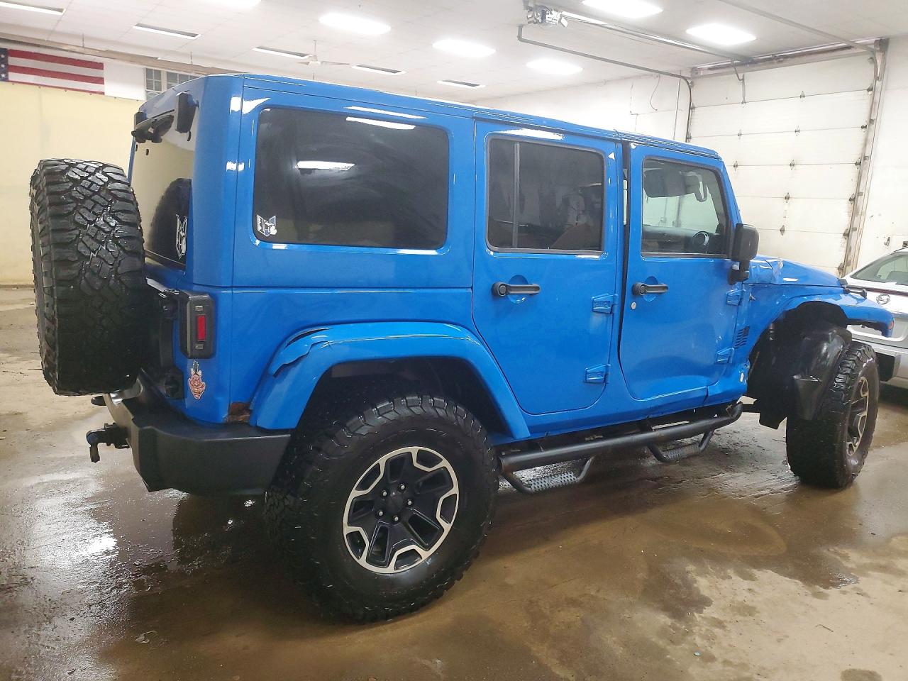 1J4BA5H16BL600159 · 2011 JEEP WRANGLER UNLIMITED · 3/13