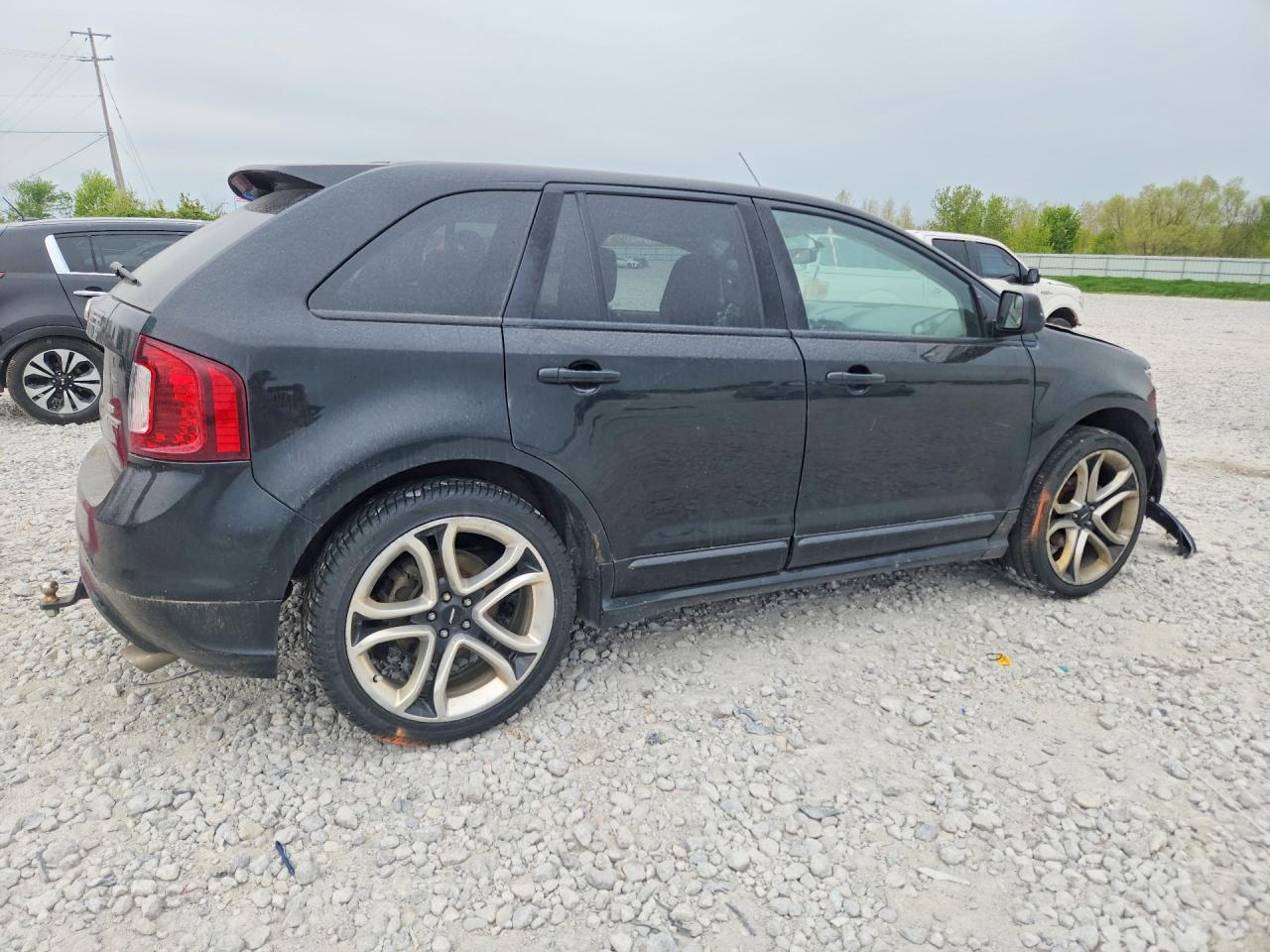 2FMDK4AK3BBA10361 · 2011 FORD EDGE · 3/12
