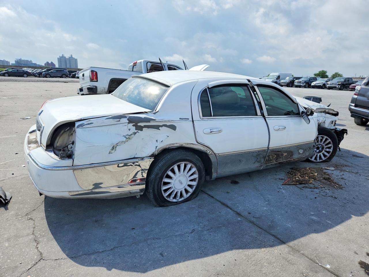 1LNHM81W84Y624320 · 2004 LINCOLN TOWN CAR · 3/12