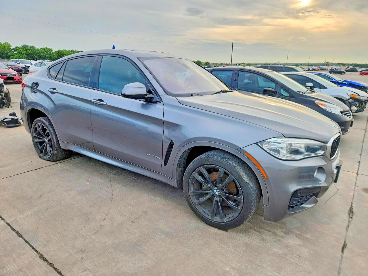 5UXKU0C59K0S97436 · 2019 BMW X6 · 4/12