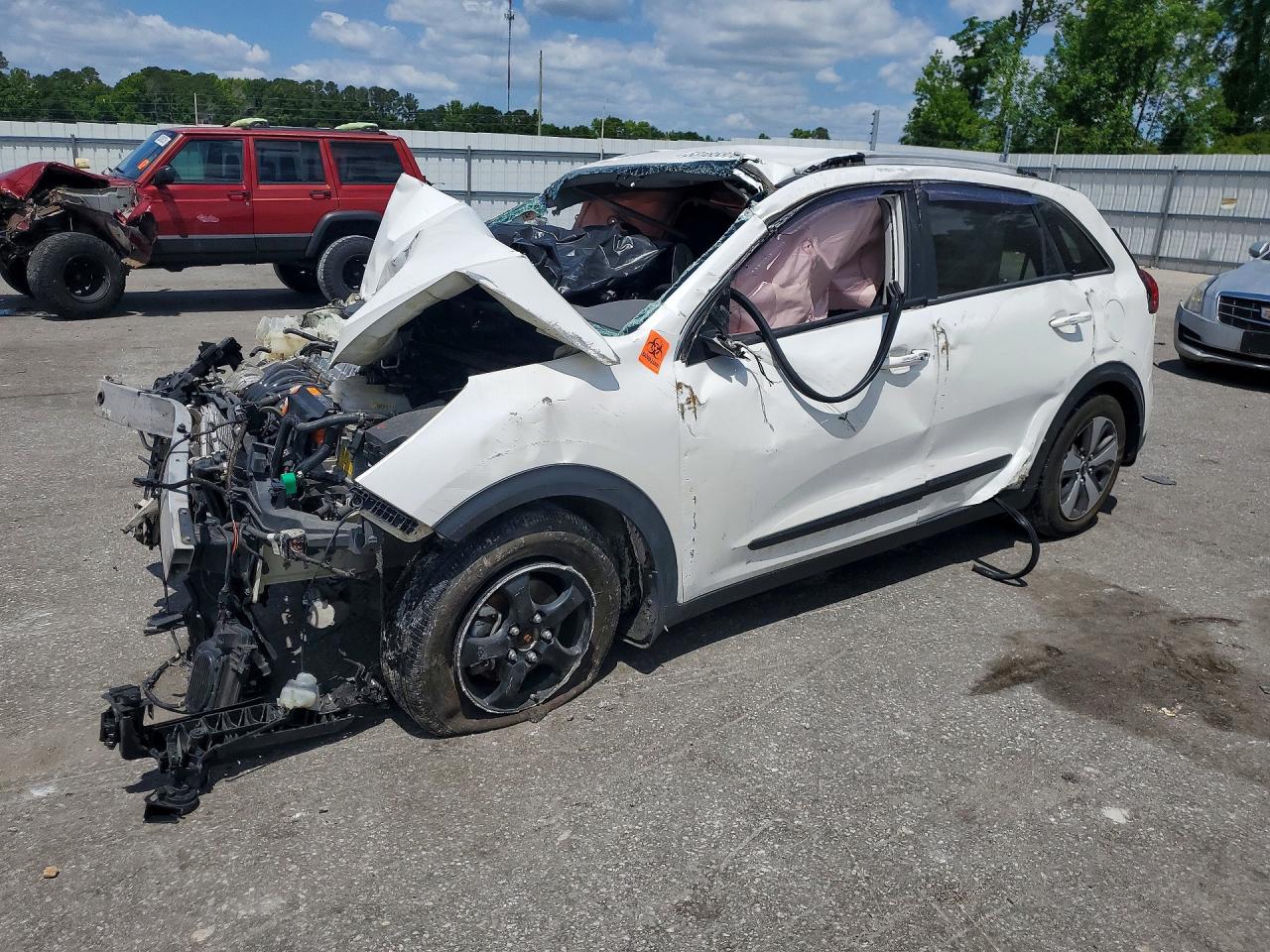 KNDCC3LC1J5110569 · 2018 KIA NIRO