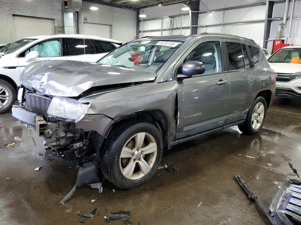 1J4NF1FB3BD263981 · 2011 JEEP COMPASS