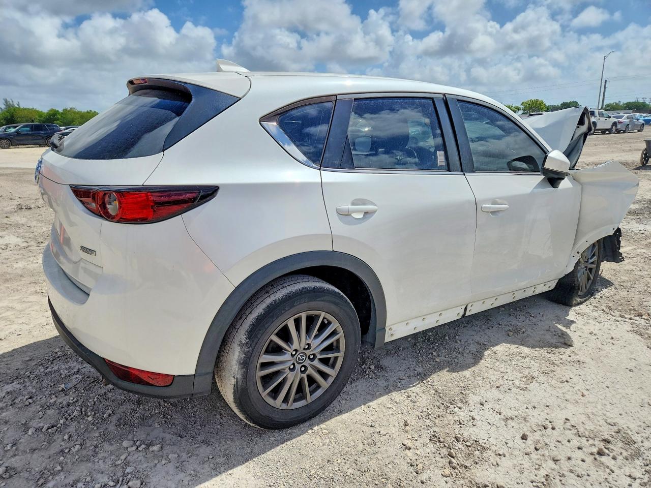 JM3KFABM9J1454988 · 2018 MAZDA CX-5 · 3/13