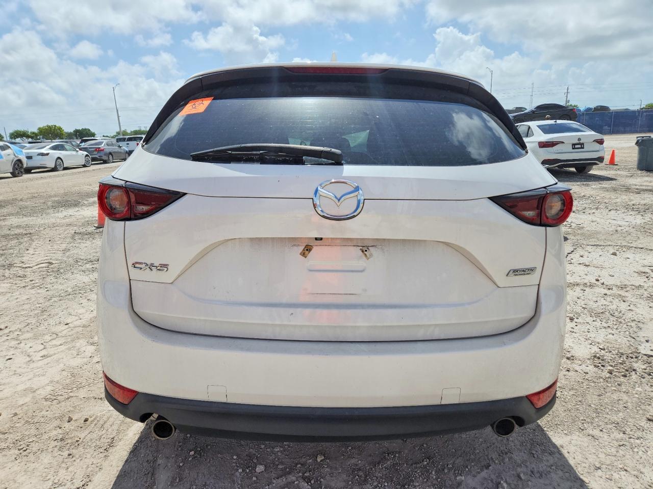 JM3KFABM9J1454988 · 2018 MAZDA CX-5 · 6/13