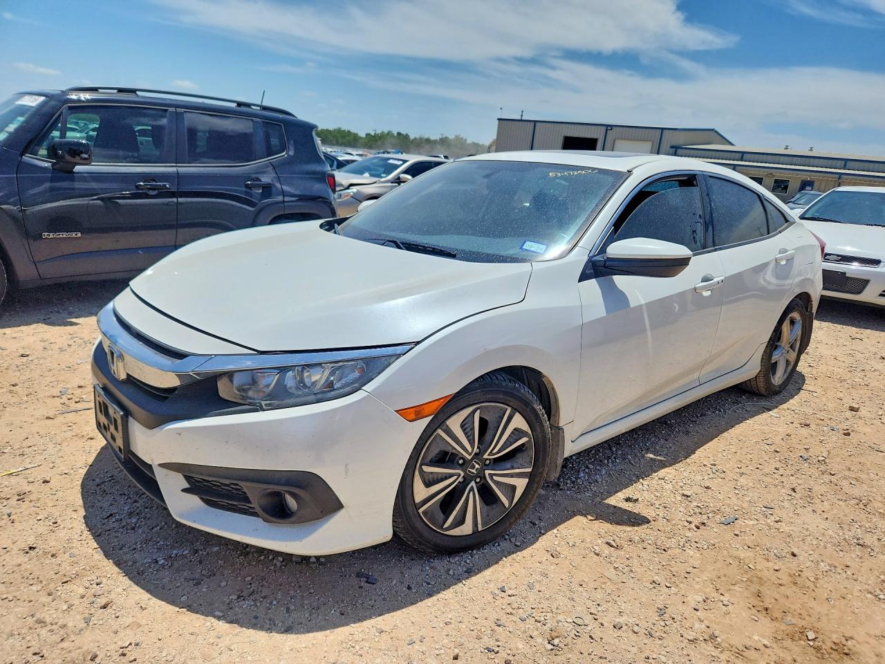 JHMFC1F78JX021231 · 2018 HONDA CIVIC