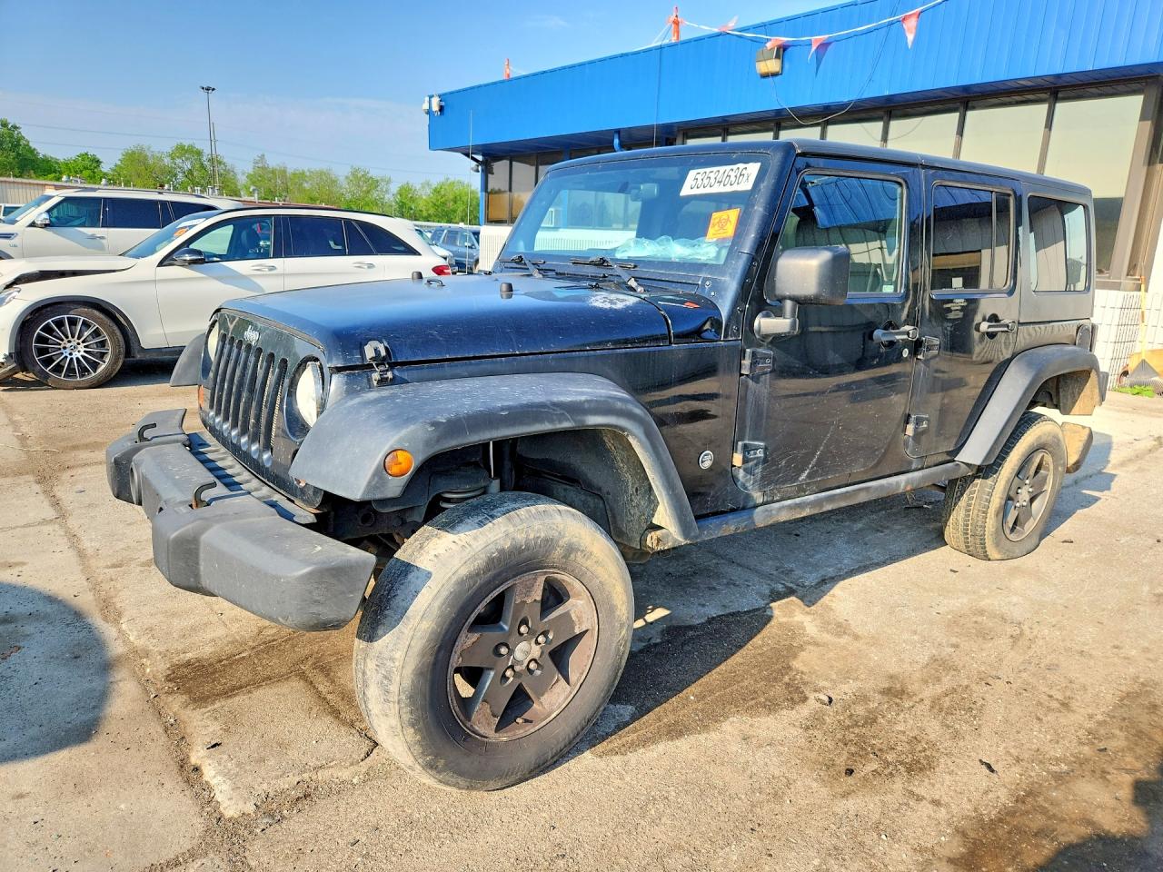 1J4HA6H13BL573390 · 2011 JEEP WRANGLER UNLIMITED