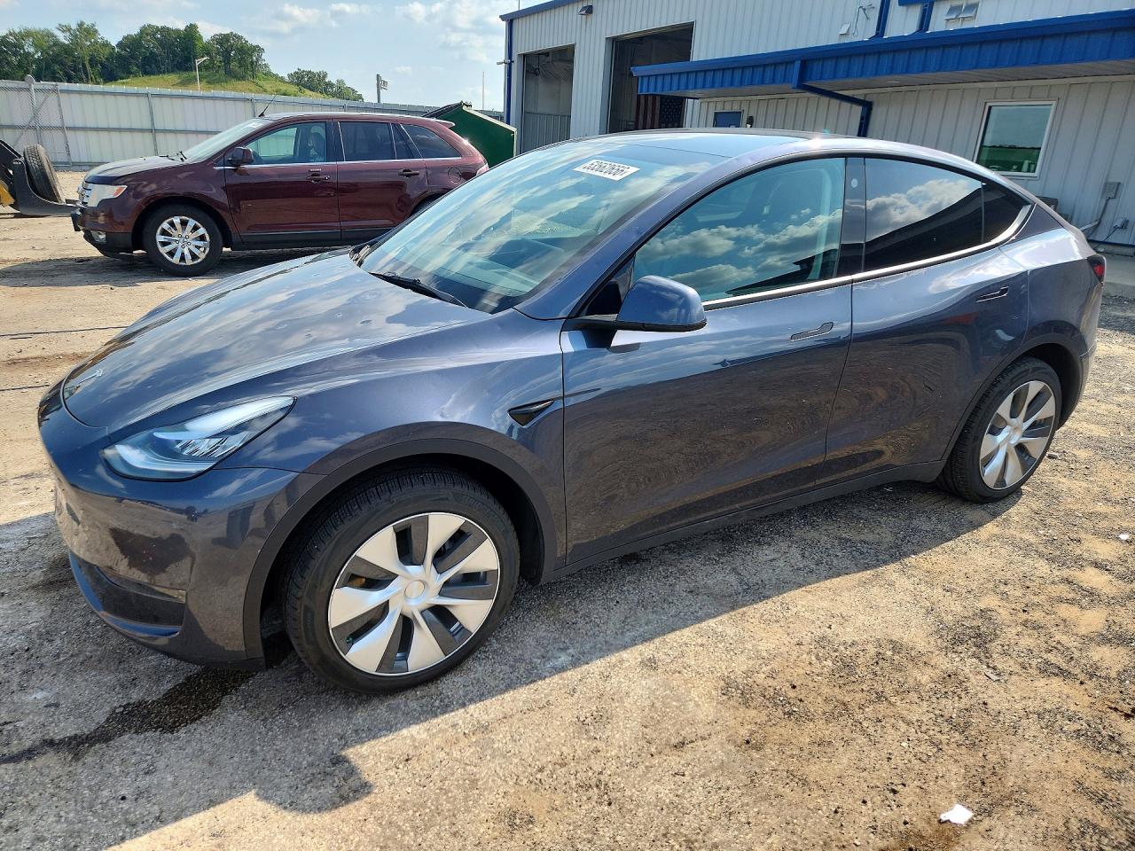 7SAYGDEE8PF614092 · 2023 TESLA MODEL Y