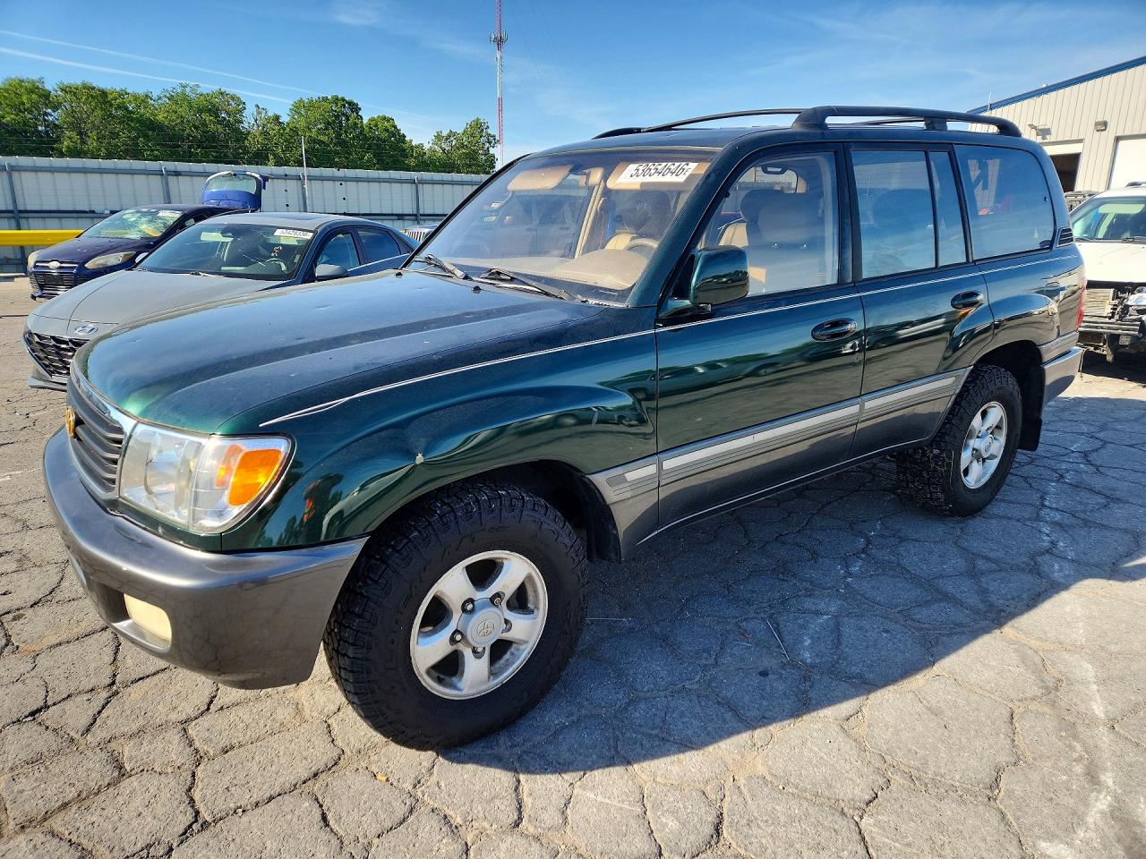 JT3HT05J7X0059976 · 1999 TOYOTA LAND CRUISER