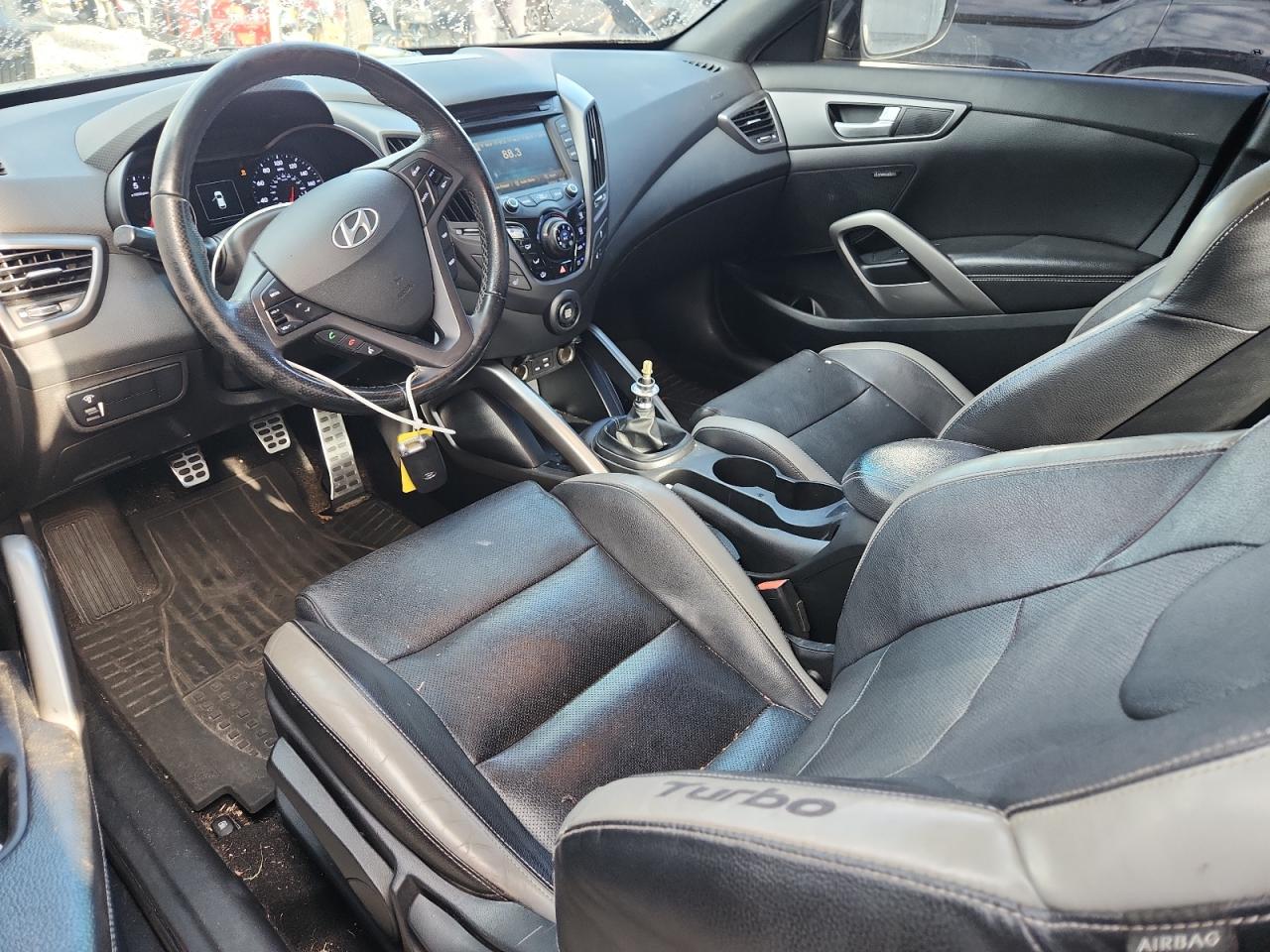 KMHTC6AE6GU303736 · 2016 HYUNDAI VELOSTER · 8/12