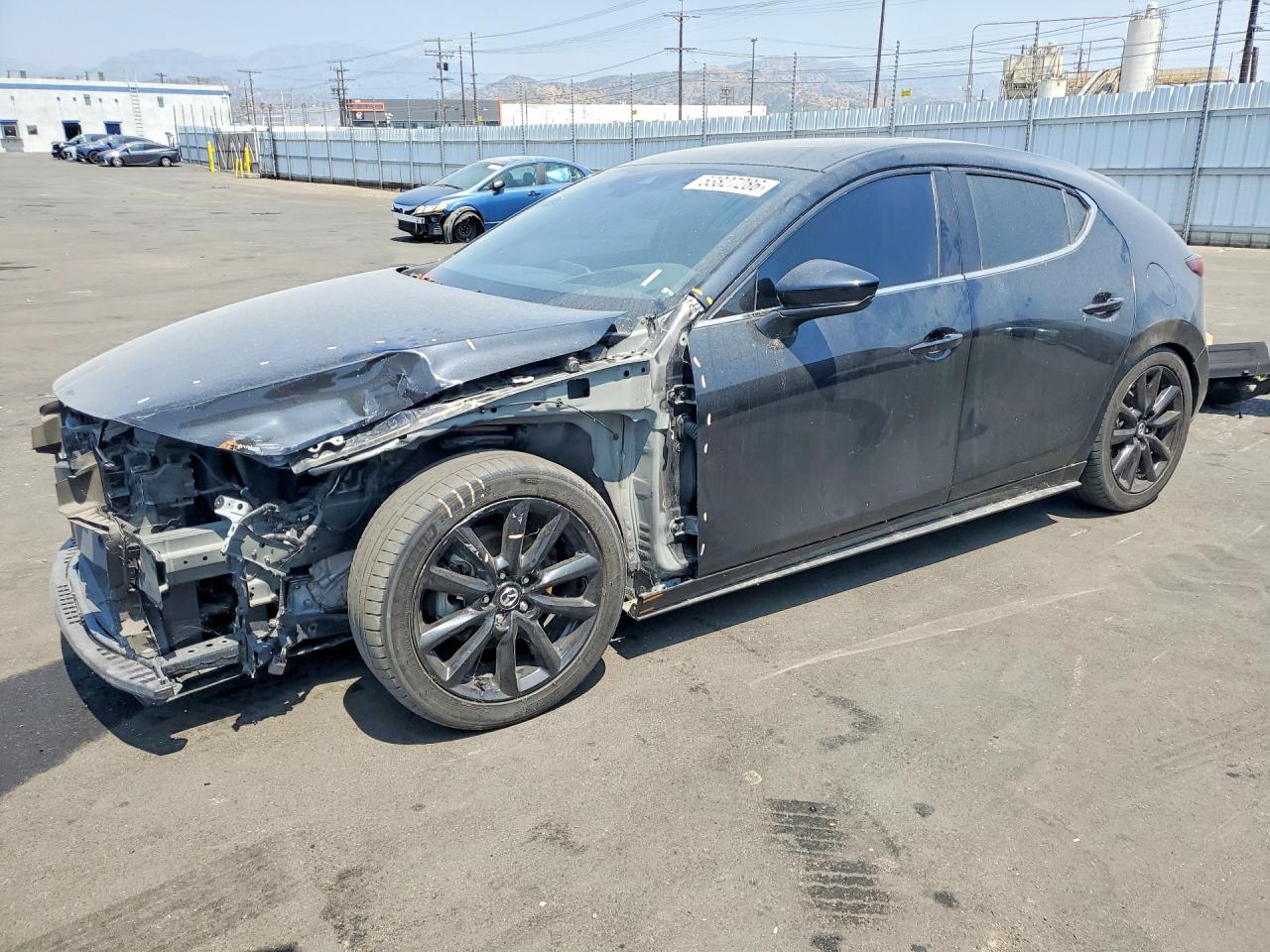 JM1BPBJY2M1343591 · 2021 MAZDA 3