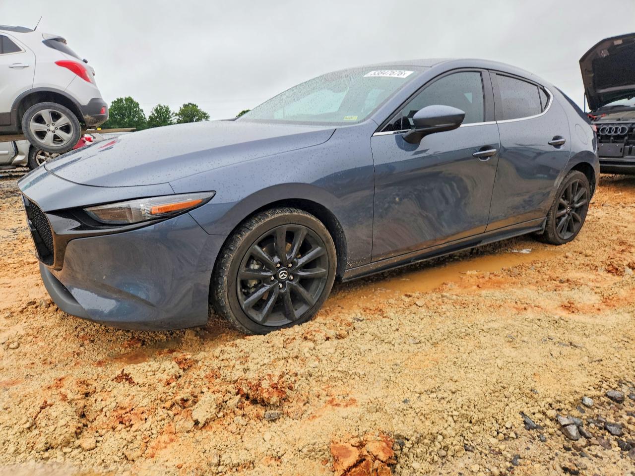 JM1BPBML2M1301034 · 2021 MAZDA 3