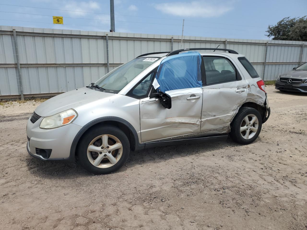 JS2YA413996201203 · 2009 SUZUKI SX4