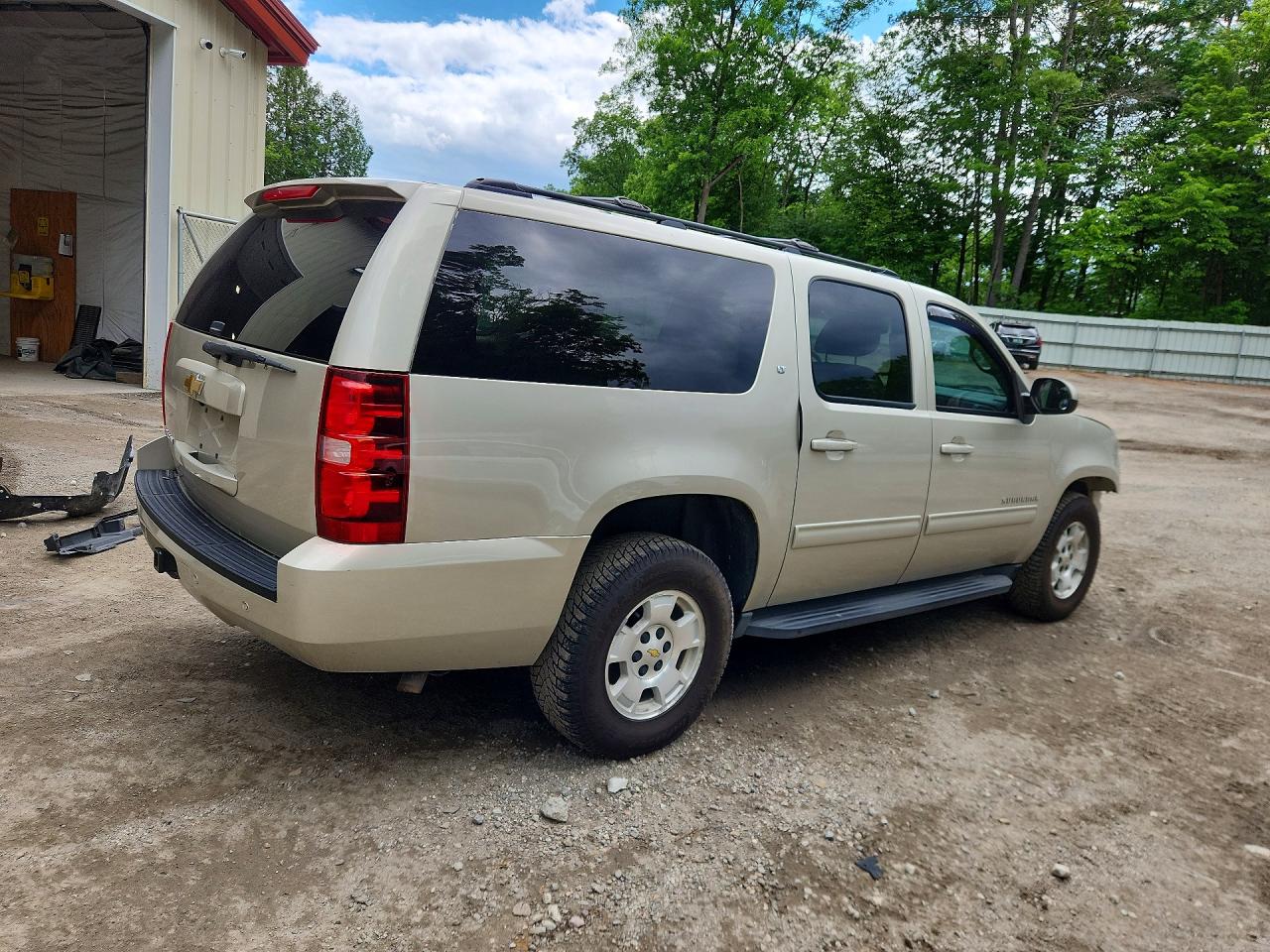1GNSKJE77DR345212 · 2013 CHEVROLET SUBURBAN · 3/14