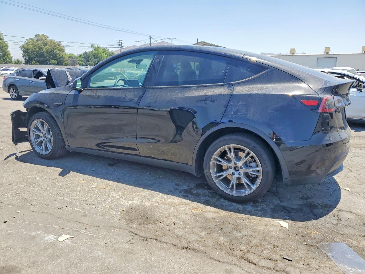 7SAYGDEE6RF069092 · 2024 TESLA MODEL Y · 2/12