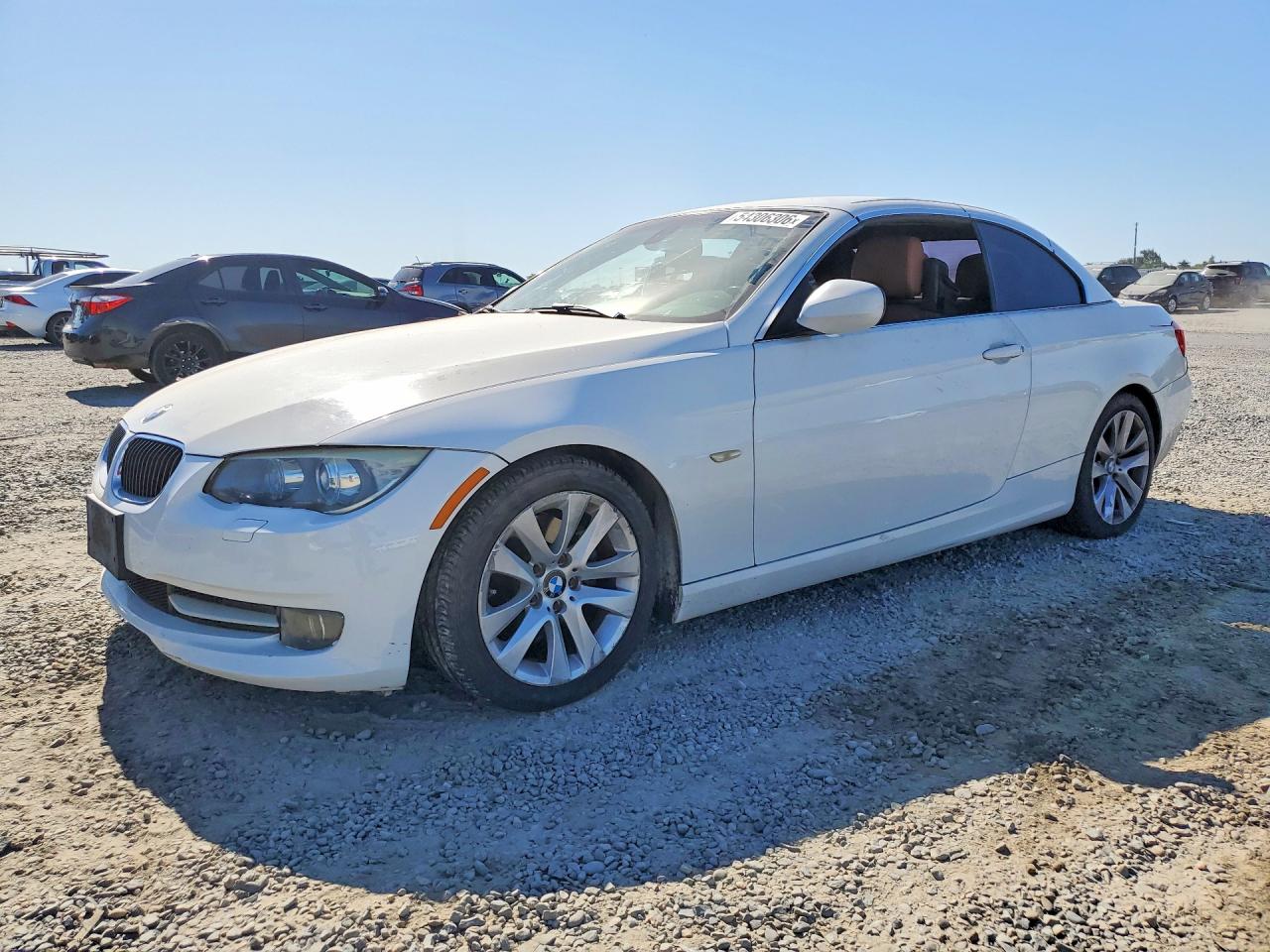 WBADW7C51BE443678 · 2011 BMW 328