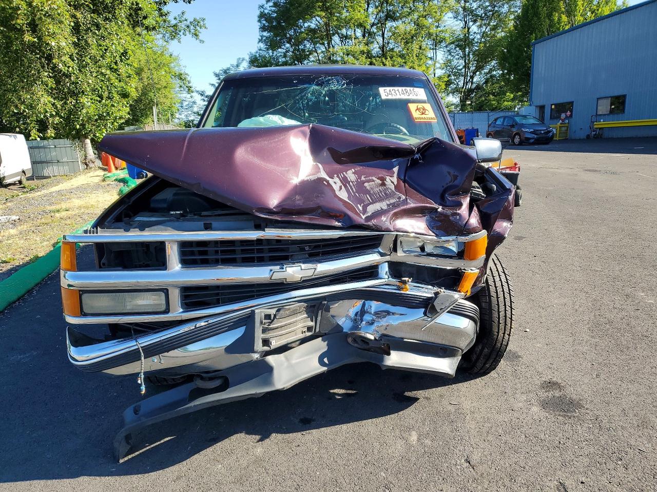 1GNEK13R0VJ375945 · 1997 CHEVROLET TAHOE · 5/12