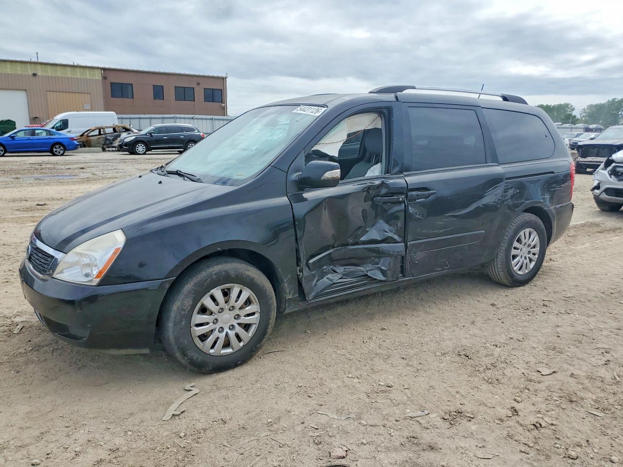 KNDMG4C75B6412332 · 2011 KIA SEDONA