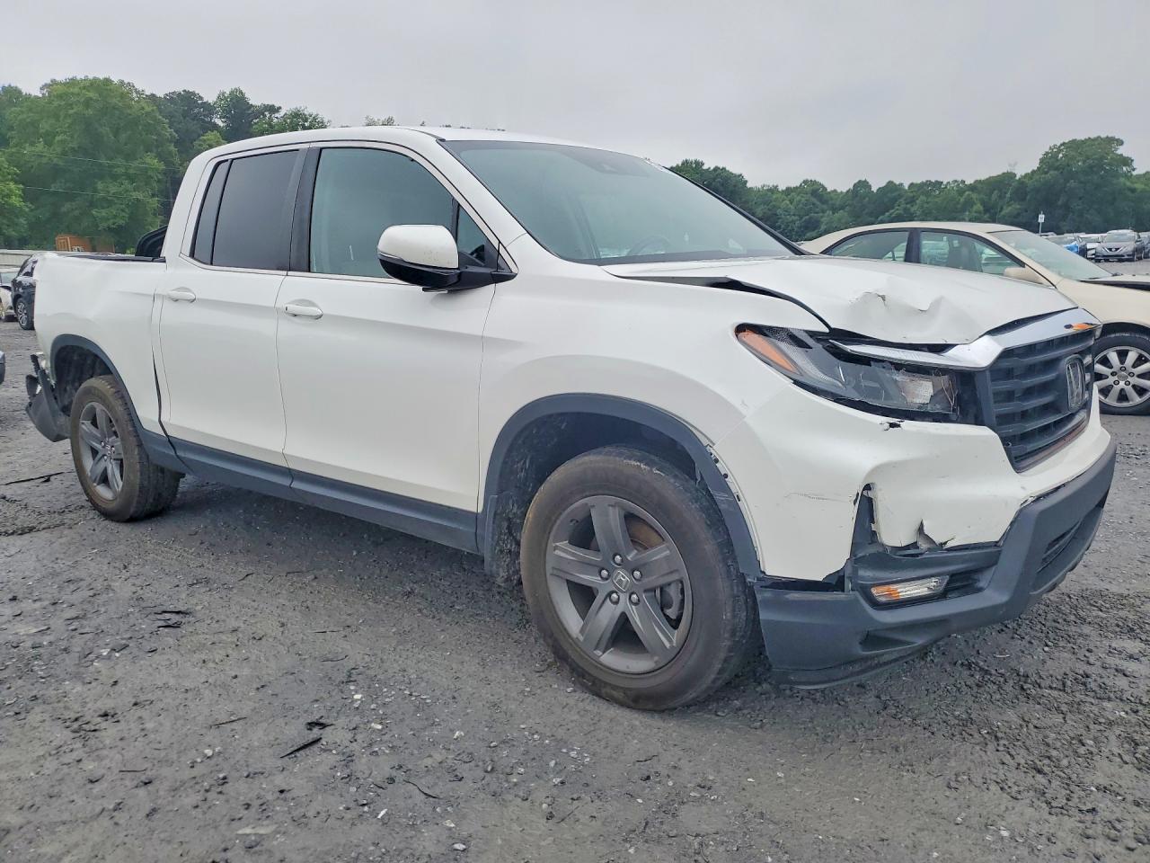 5FPYK3F55PB013363 · 2023 HONDA RIDGELINE · 4/12