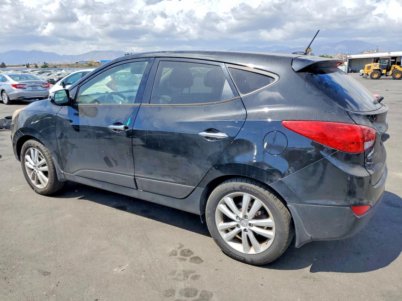 KM8JUCAC3CU510239 · 2012 HYUNDAI TUCSON · 2/13