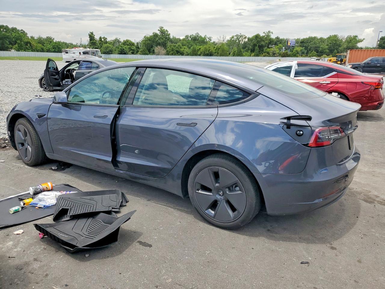 5YJ3E1EA0PF579492 · 2023 TESLA MODEL 3 · 2/12
