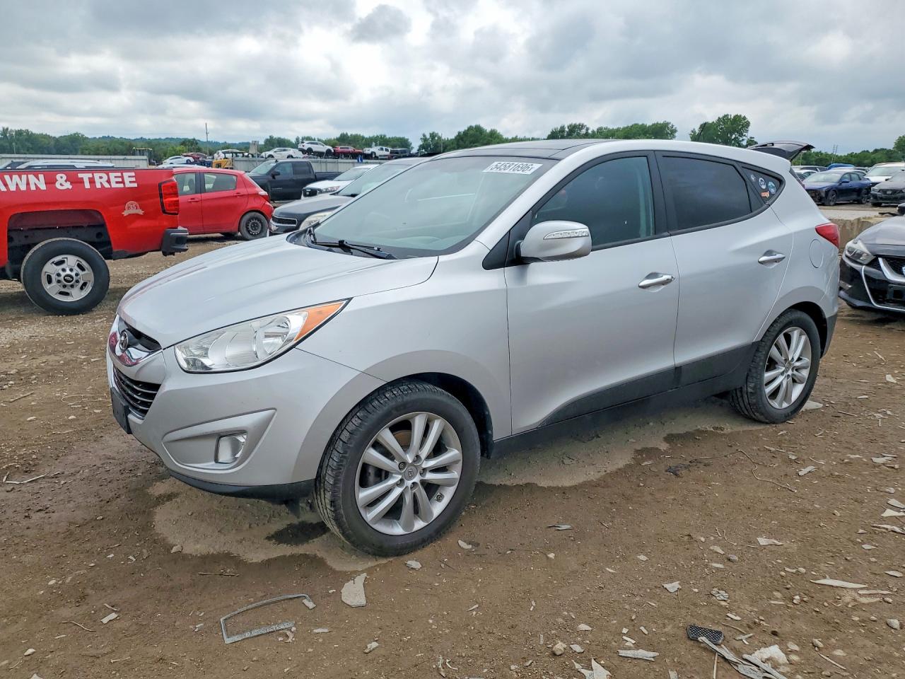 KM8JUCAC0DU578645 · 2013 HYUNDAI TUCSON