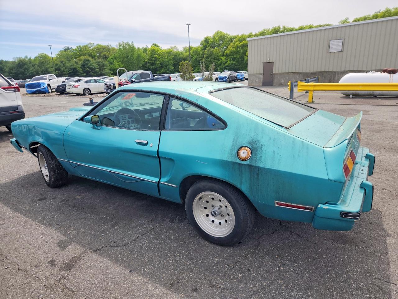 7R03F102360 · 1977 FORD MUSTANG · 2/11