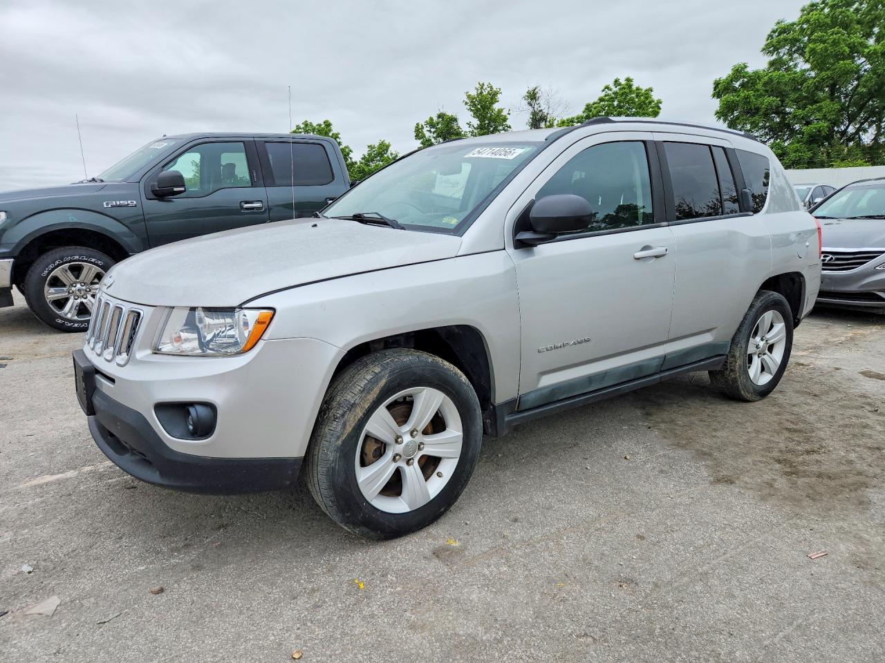 1J4NF1FB2BD159093 · 2011 JEEP COMPASS