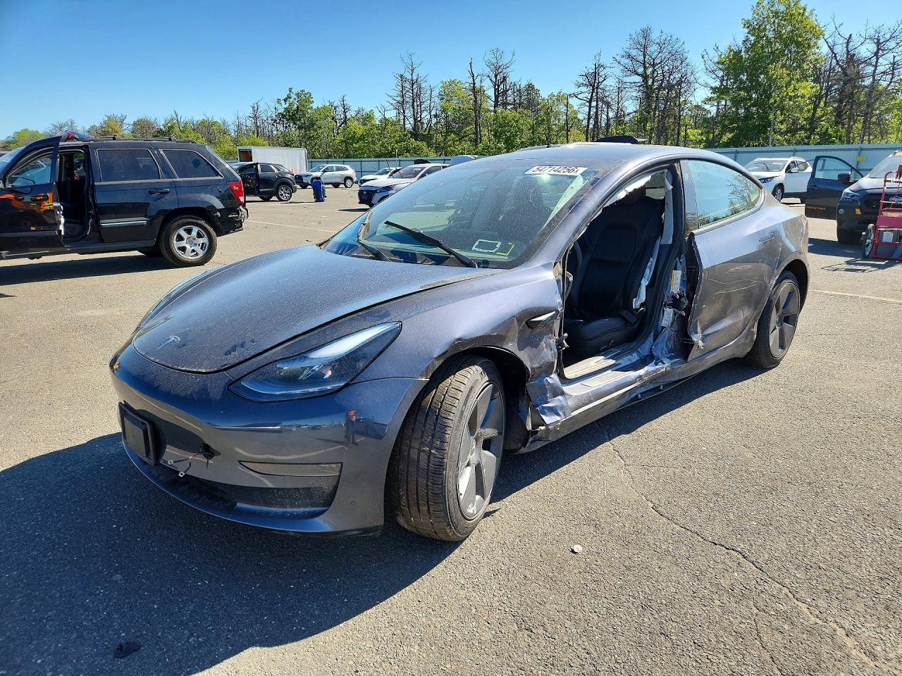 5YJ3E1EA2PF396191 · 2023 TESLA MODEL 3