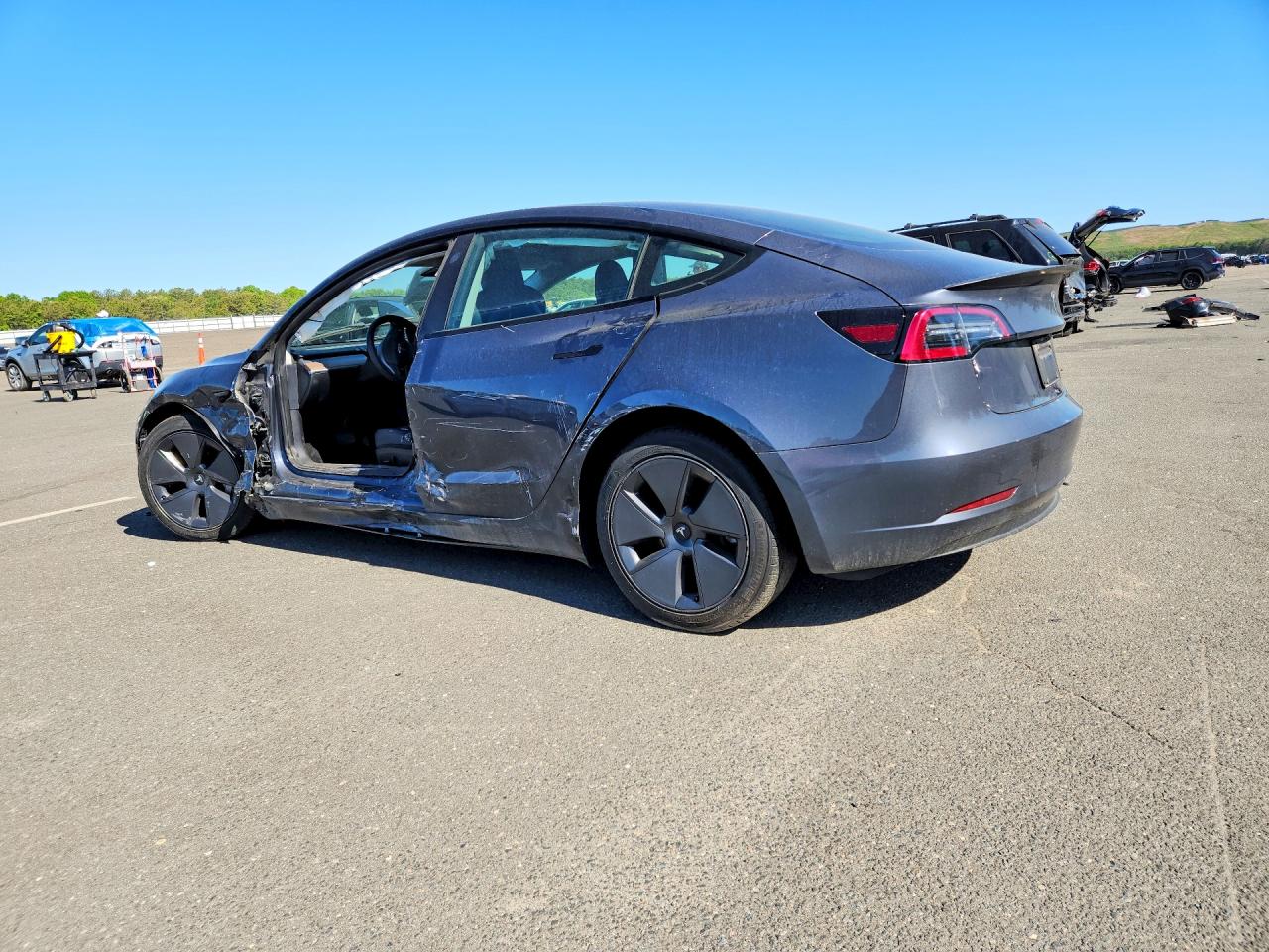 5YJ3E1EA2PF396191 · 2023 TESLA MODEL 3 · 2/12