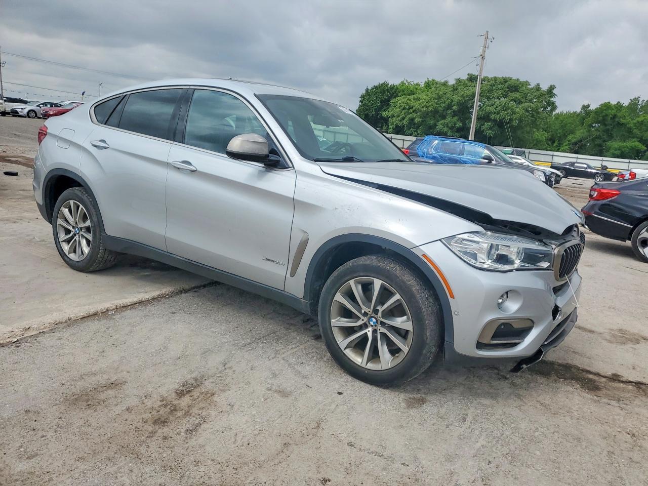 5UXKU2C55K0Z63574 · 2019 BMW X6 · 4/13