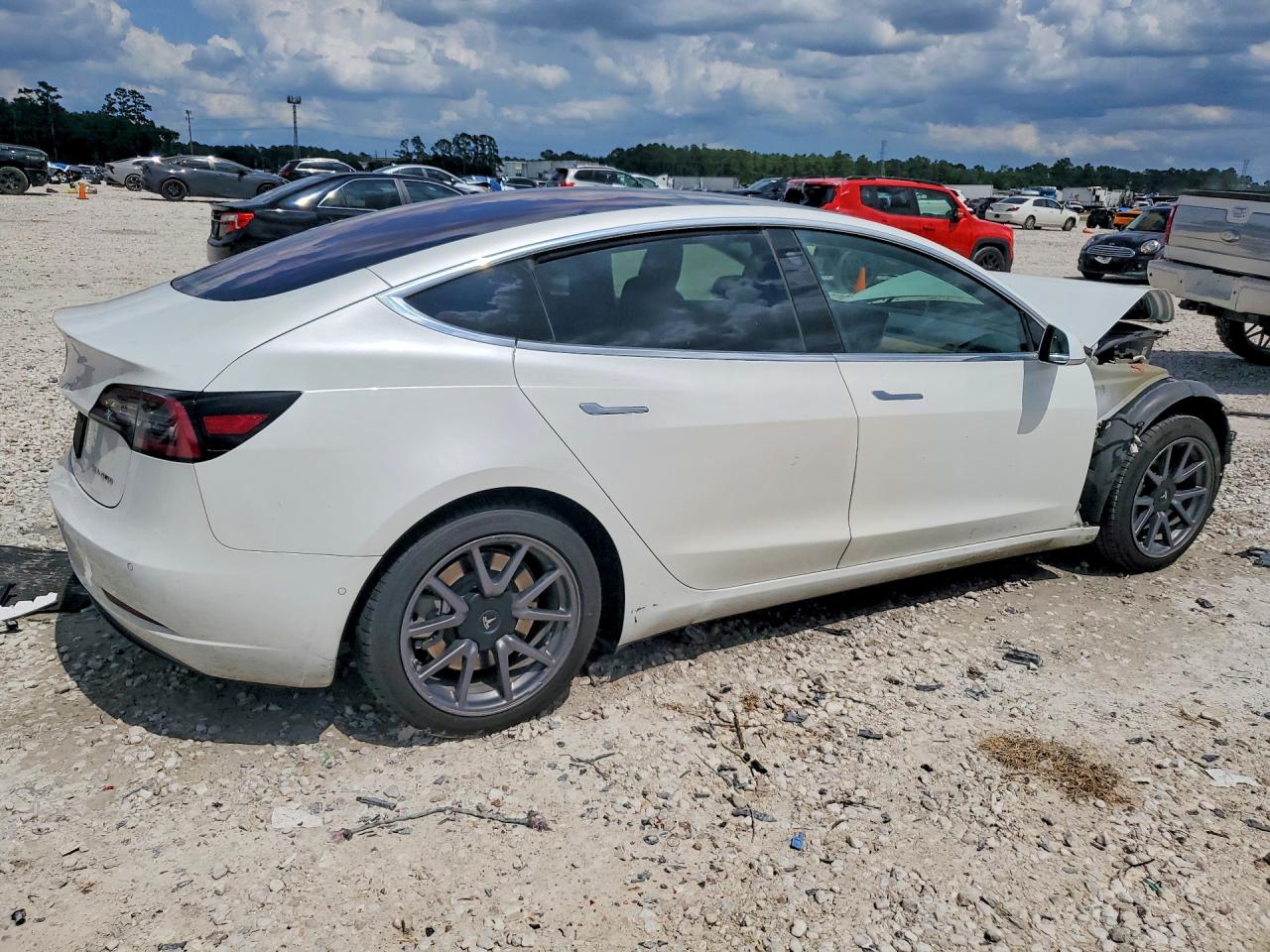 5YJ3E1EB6JF178948 · 2018 TESLA MODEL 3 · 3/13