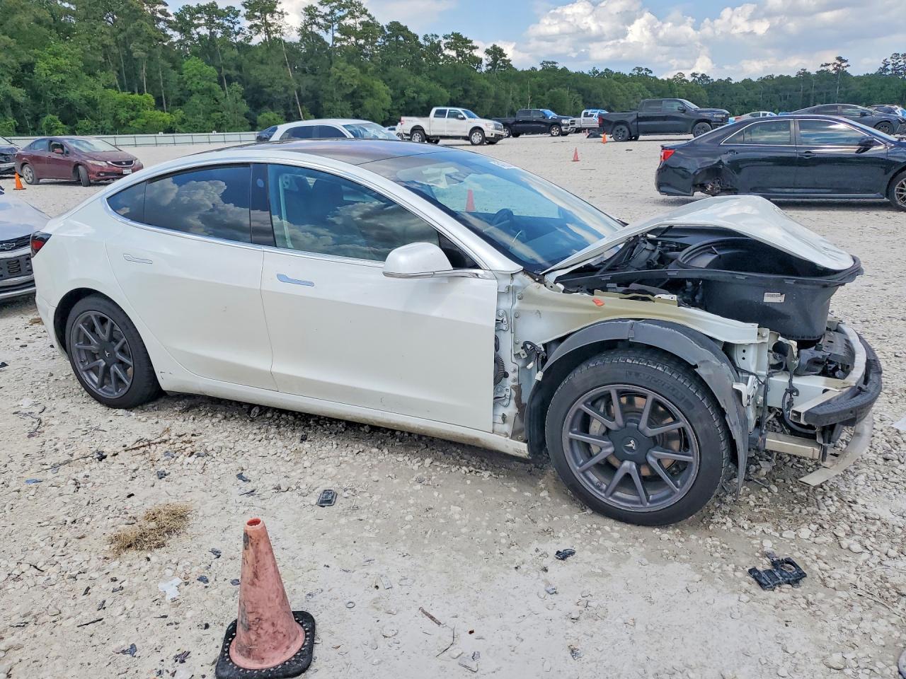 5YJ3E1EB6JF178948 · 2018 TESLA MODEL 3 · 4/13