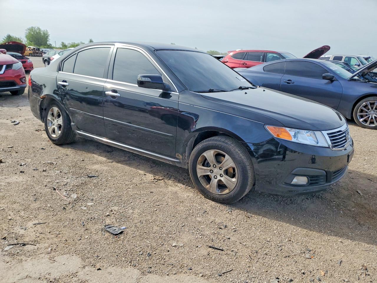 KNAGE228995324169 · 2009 KIA OPTIMA · 4/12