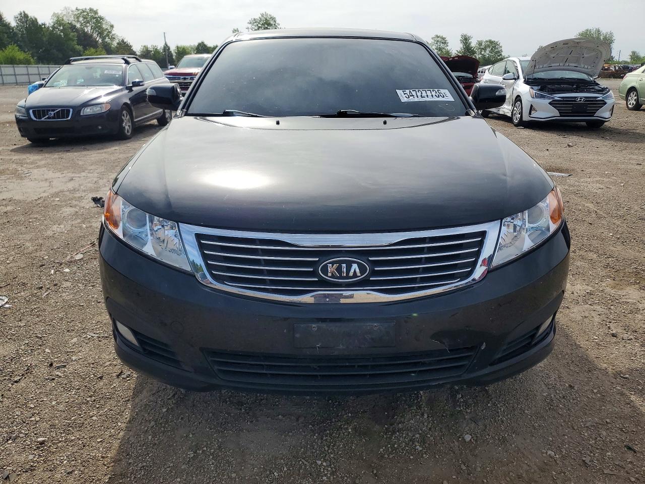 KNAGE228995324169 · 2009 KIA OPTIMA · 5/12