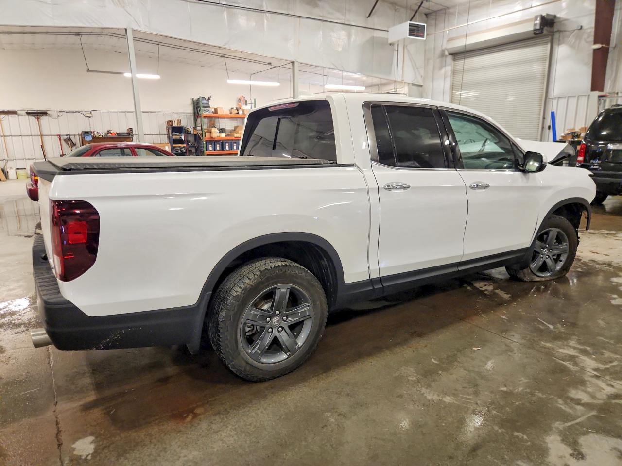 5FPYK3F75PB057655 · 2023 HONDA RIDGELINE · 3/12
