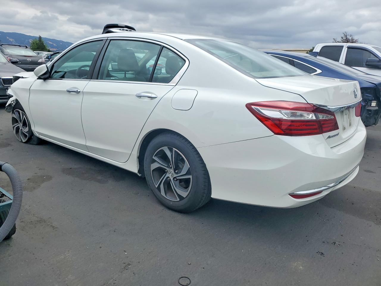 1HGCR2F32HA221509 · 2017 HONDA ACCORD · 2/12