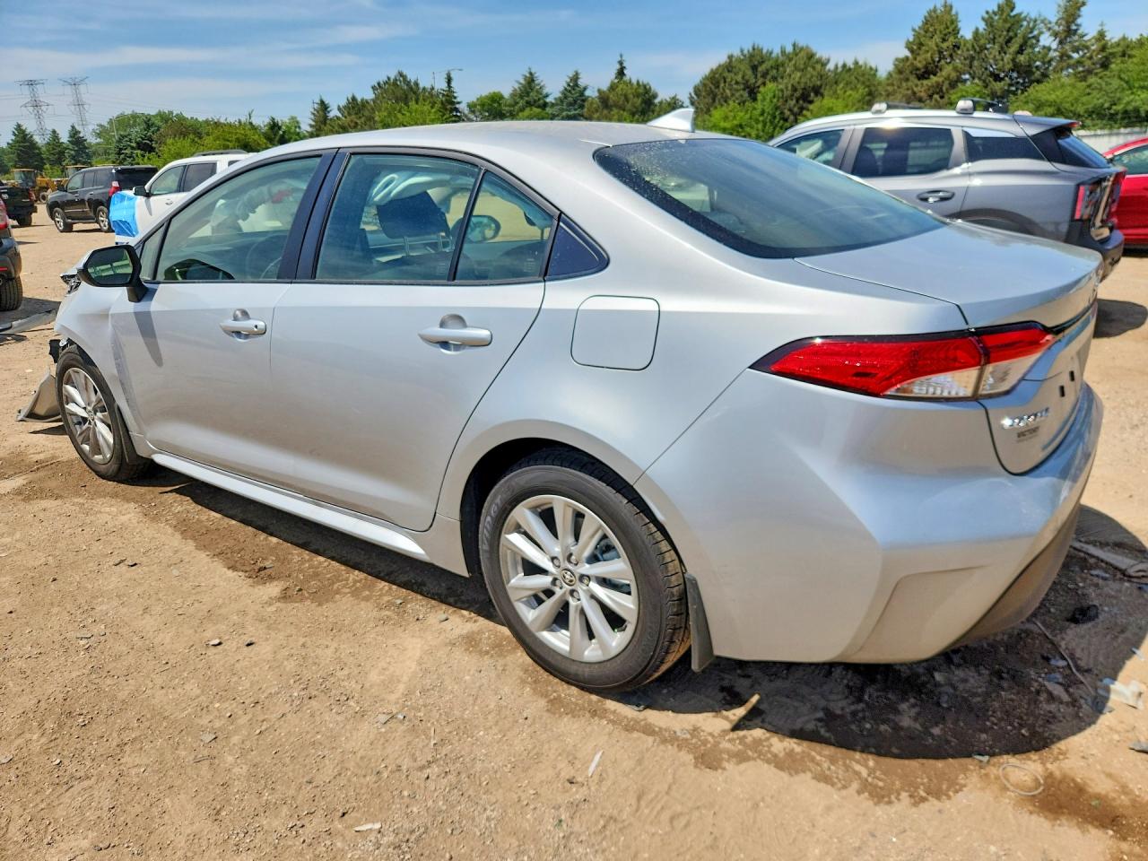 JTDBCMFE2T3144887 · 2026 TOYOTA COROLLA HYBRID · 2/12