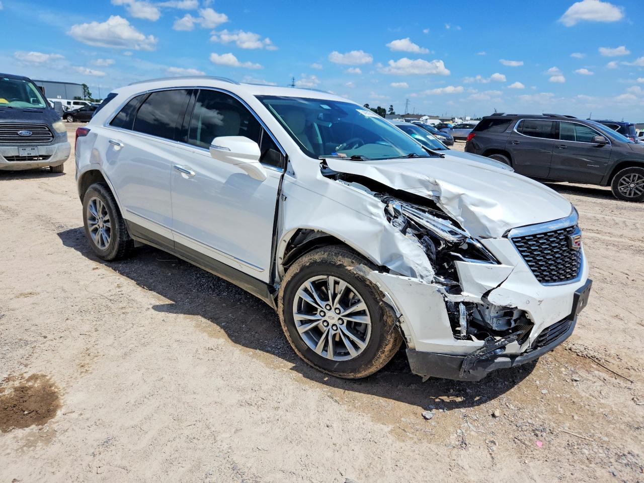 1GYKNCR46NZ159457 · 2022 CADILLAC XT5 · 4/13